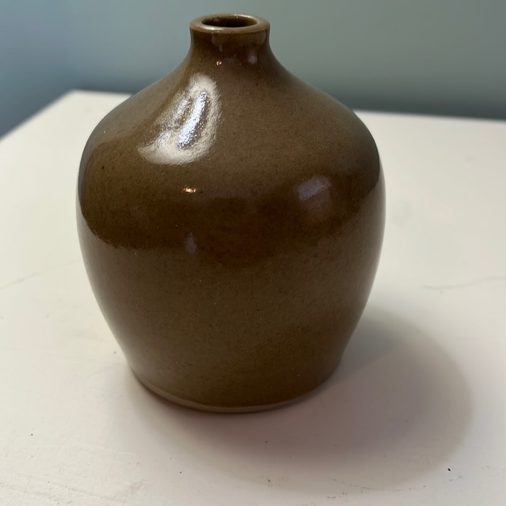 Small round pottery piece.